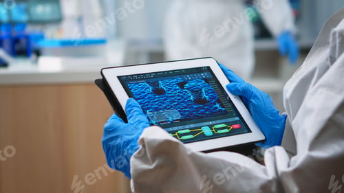 Preview: Back view of doctor in protection suit analyzing virus evolution