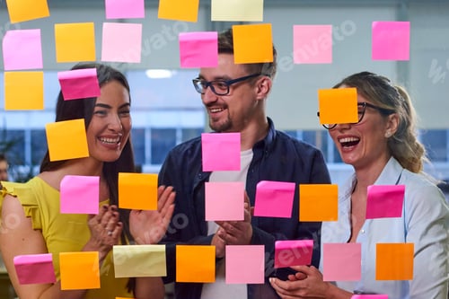 Preview: Two caucasian mature women and a man discussing ideas on stickers
