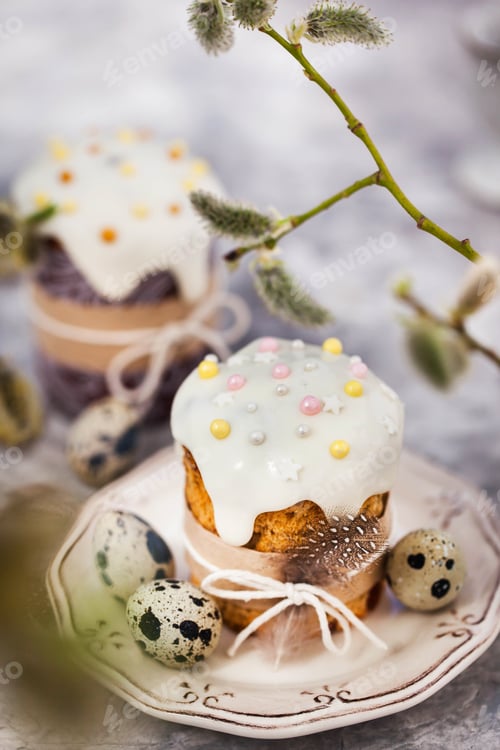 Preview: Sweet Easter bread, panettone or kulich and colorful painted eggs, Holiday spring concept