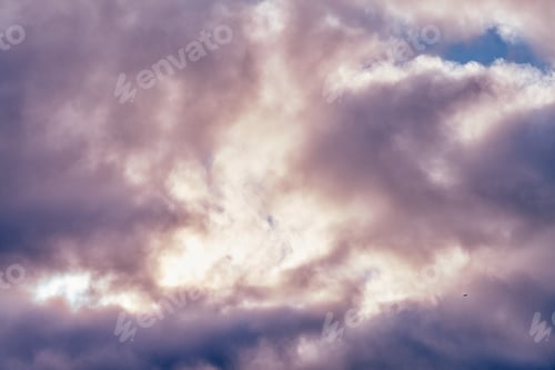 Preview: Fluffy cumulus purple and pink clouds, cloudscape