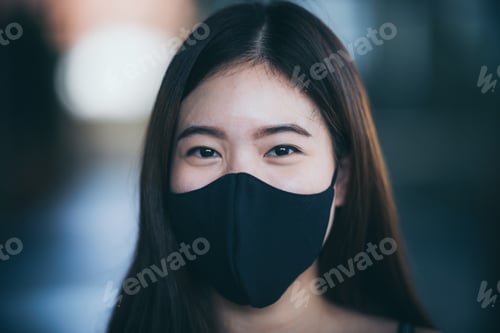 Preview: Young woman wearing cotton virus mouth nose surgical mask face protection