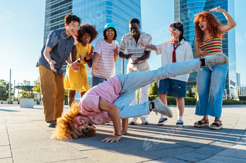 Preview: Multiethnic group of young friends meeting and having fun outdoors