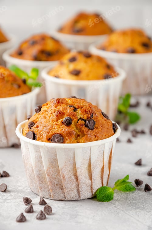 Preview: Golden Chocolate Chip Muffins with Mint Sprigs