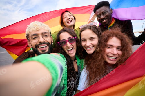 Preview: Portrait of a group of people are taking a selfie with a rainbow flag