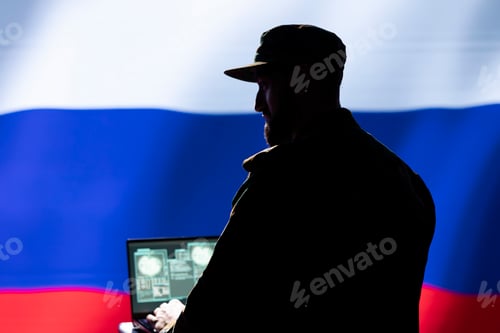 Preview: Silhouette of Man Working on Laptop with Flag