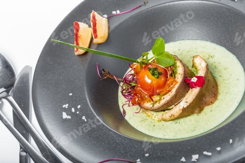 Preview: fish fillet with sauce baked and decorated