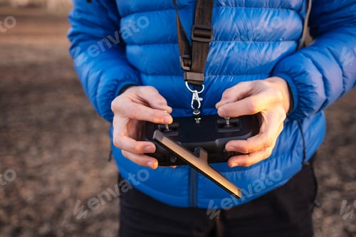 Preview: Person holding remote controller