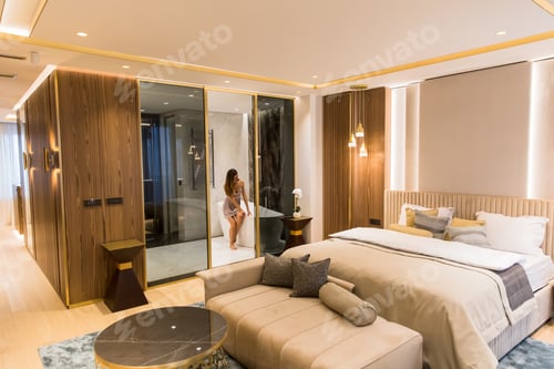 Preview: Young woman in the bathroom of a contemporary apartment