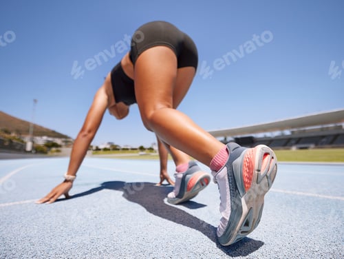Preview: Woman, runner and fitness of a athlete about to start a run on a sport track outdoor. Exercise, spo