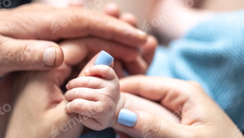 Preview: Close-up, the hands of the baby, mom and grandmother.