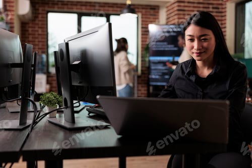 Preview: Confident cyber security officer accesing administrator rights by bypassing firewall defence system.