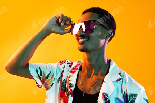 Preview: African man portrait in studio on colorful background