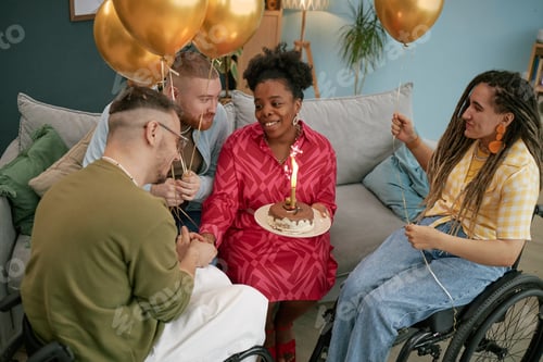 Preview: Multiethnic Young Adults with Disability Celebrating Birthday Indoors Smiling