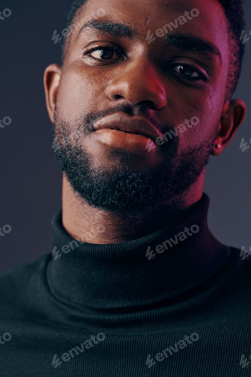 Preview: Close up portrait of a confident Black man in a turtleneck, conveying determination and style