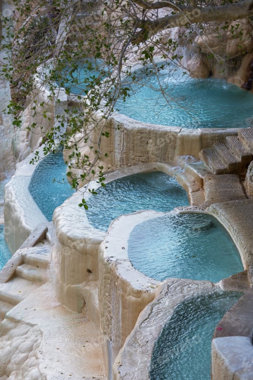 Beautiful Turquoise Water Cascading Down Terraced Pools