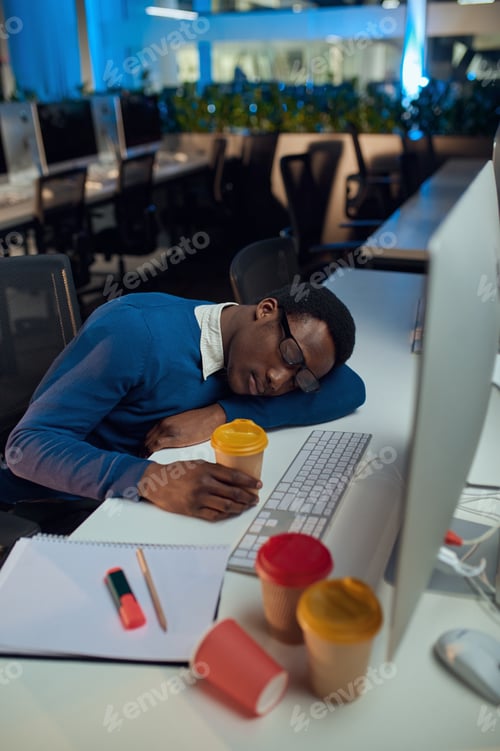 Preview: Manager sleeping at table, night office lifestyle