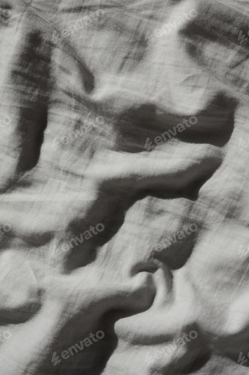 Preview: Abstract background of a crumpled bed cloth