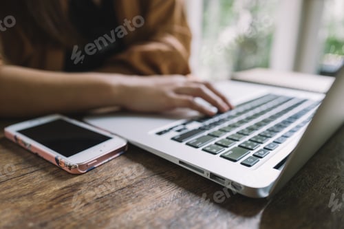 Preview: Mobile and laptop on the work