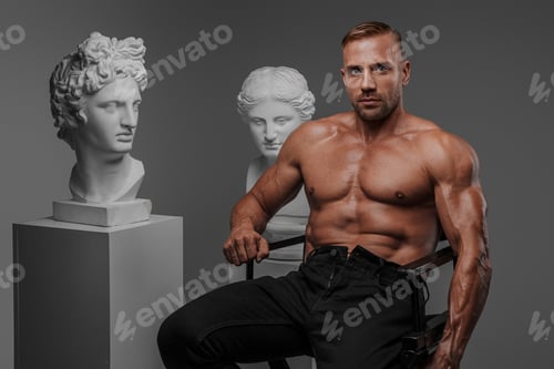 Preview: A sensual, muscular man in black jeans