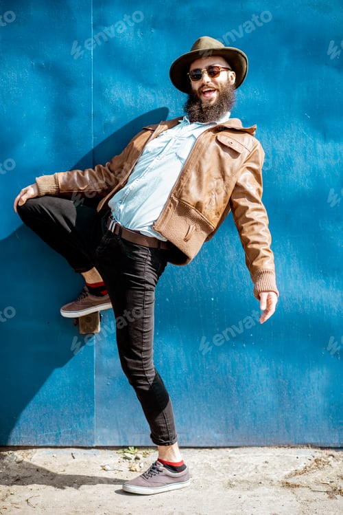 Preview: Portrait of a stylish man on the colorful background