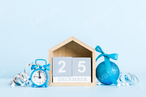 Preview: 25 december. Christmas composition on colored background with a wooden calendar