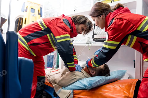Preview: Paramedics in latex gloves doing cardiopulmonary resuscitation