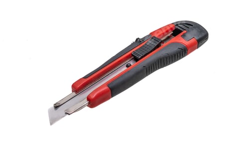 Preview: red wallpaper knife on a white isolated background