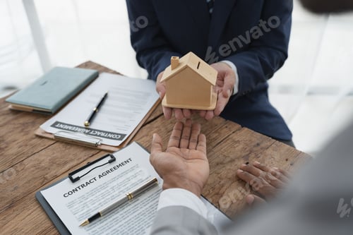 Preview: Real estate agents, insurance agents , The businessman delivers the model house or model house to th