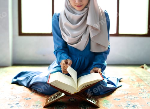 Preview: Muslim woman reading from the quran