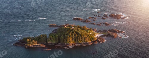 Preview: Rocky Shore on the Pacific Ocean Coast in Tofino, Vancouver Island, BC, Canada. Sunset. Aerial