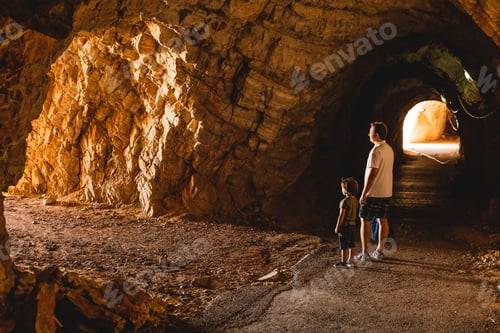 Preview: Tunnel cut out in the cliffs on the walking path