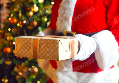 Preview: Santa Claus secretly putting gift boxes under the Christmas tree