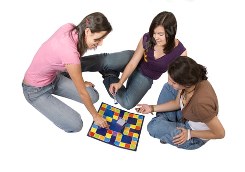 Preview: Friends Playing Board Games Over A White Background