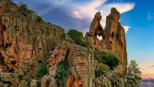 Preview: Rocky cliffs with unique formations under blue sky
