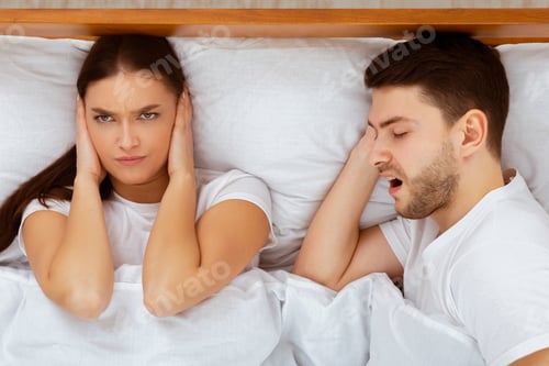 Preview: Angry Wife Trying To Sleep Near Snoring Husband At Home