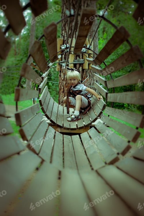 Preview: Child in an amusement park. Rope park in Kyiv
