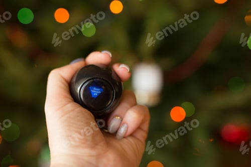Preview: magic ball on the background of the Christmas tree. ball that answers questions. Text (translation)