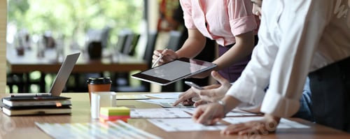 Preview: Professional team of ux designers are designing applications for smartphones.