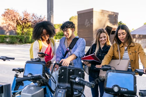 Preview: Diverse students starting shared electric bicycles on campus