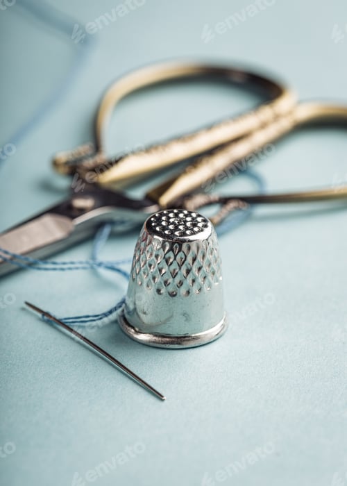 Preview: vintage silver thimble on blue
