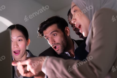 Preview: Multiethnic group of business people working together in a modern office