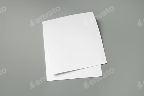 Preview: Blank paper sheets for brochure on grey background, top view. Mock up