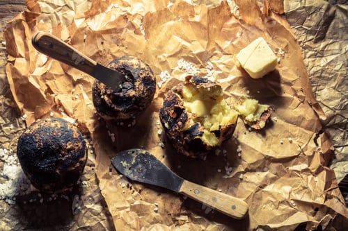 Preview: Jacket potatoes with butter made in campfire