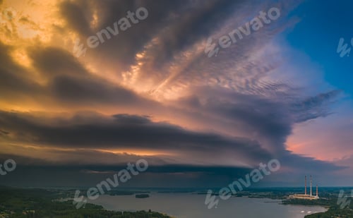 Preview: Dramatic Storm Clouds Over the Lake at Sunset