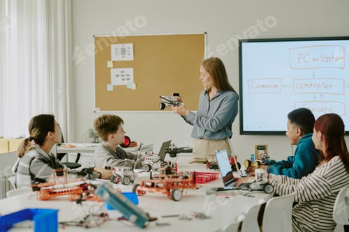 Preview: Female Teacher Showing Robot Parts