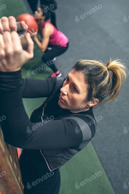 Preview: Woman hanging on the pegboard