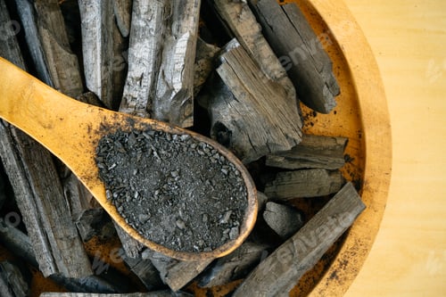 Preview: Charcoal and charcoal powder on wooden spoon.