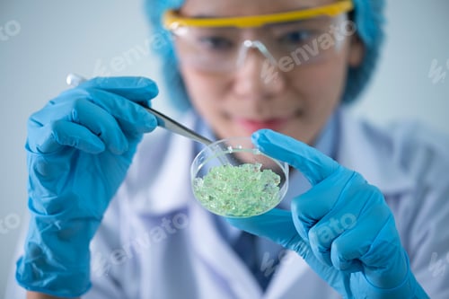Preview: Health care researchers working in life science laboratory. Young research scientist preparing