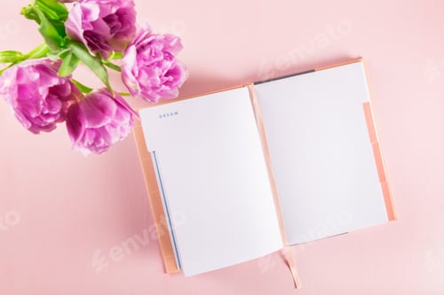 Preview: Open Notebook for writing Dreams and Ideas with flowers nearby