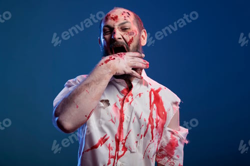 Preview: Creepy zombie biting hand with scars